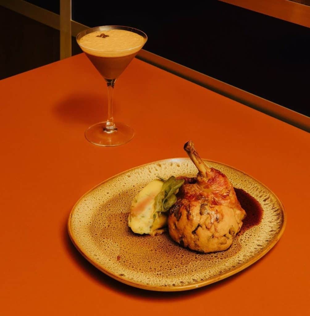French-inspired roasted chicken thigh with mash potatoes and espresso martini