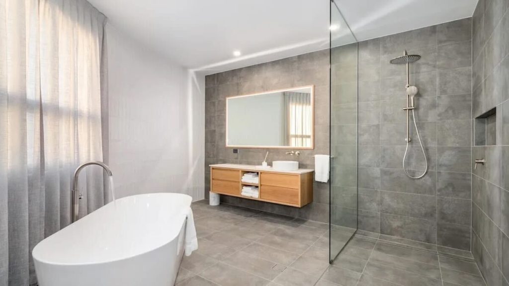 Luxury bathroom with grey and white minimal tones