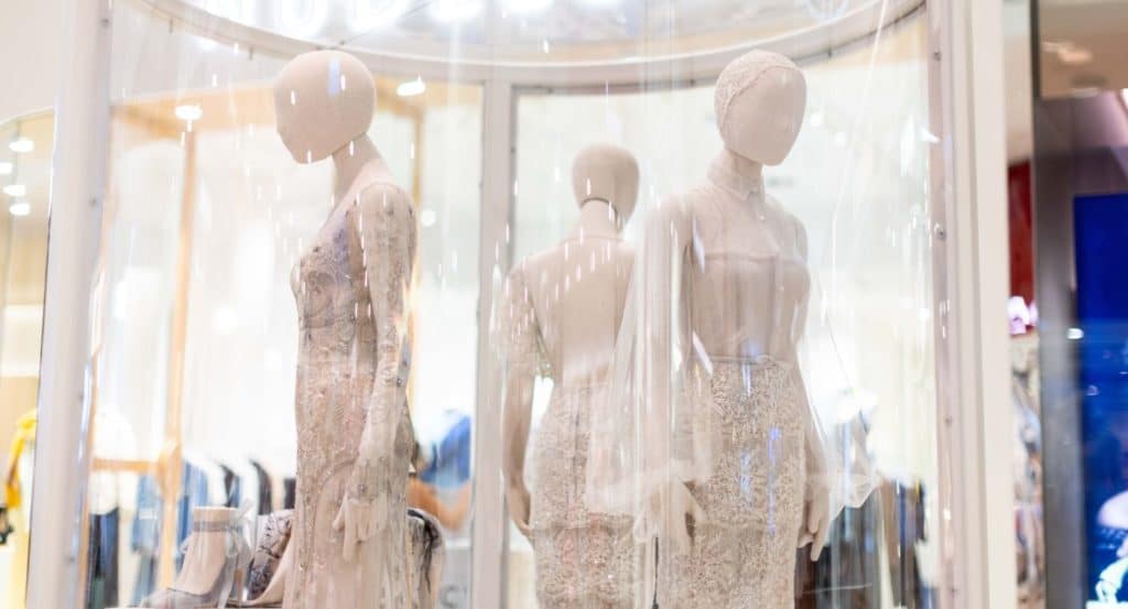 Three mannequins in Paolo Sebastian beige gowns